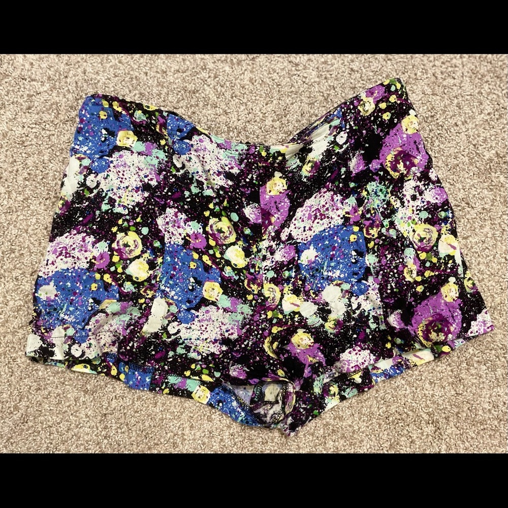 Brass Plum (Small/Medium) high-waisted zip shorts.